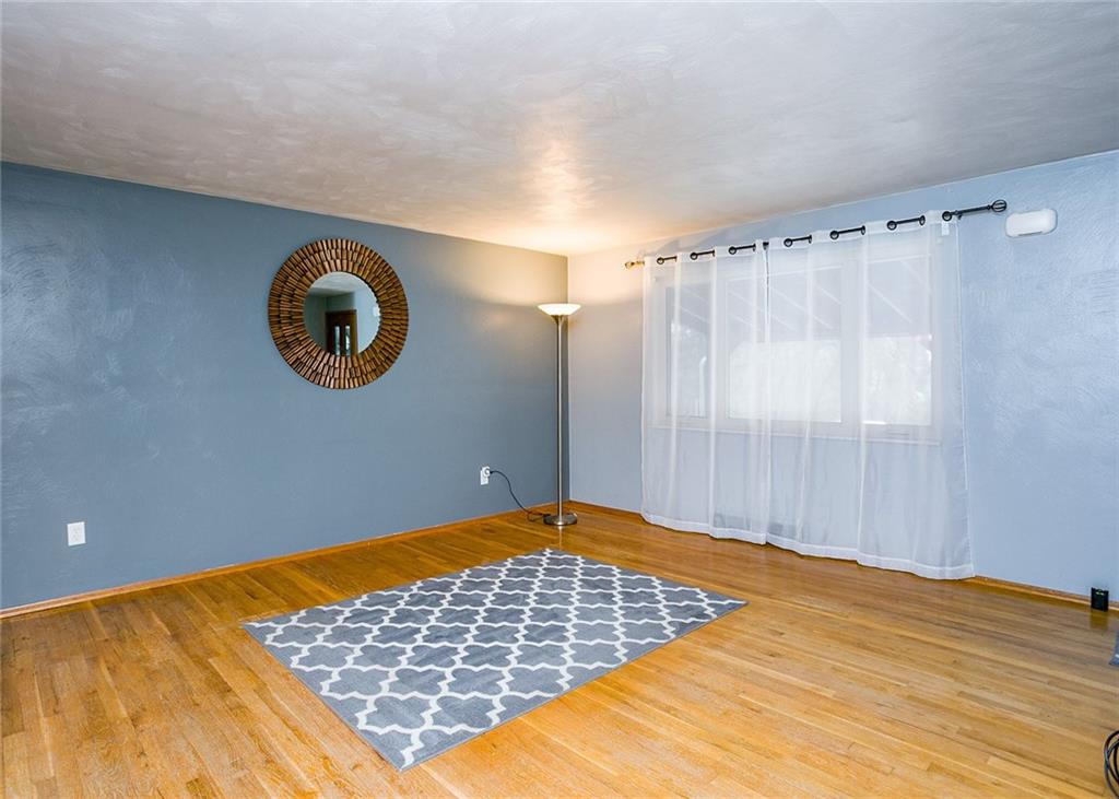 869 Blue Ridge Road Pittsburgh, PA 15239 - Photo 4 of 25 Large living room with gorgeous window.