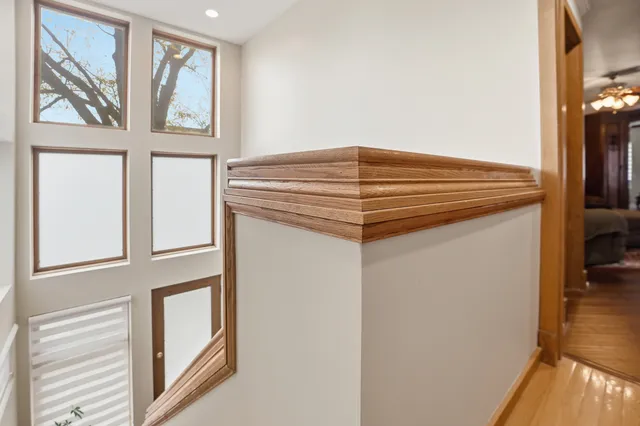 a view of an entryway with wooden floor