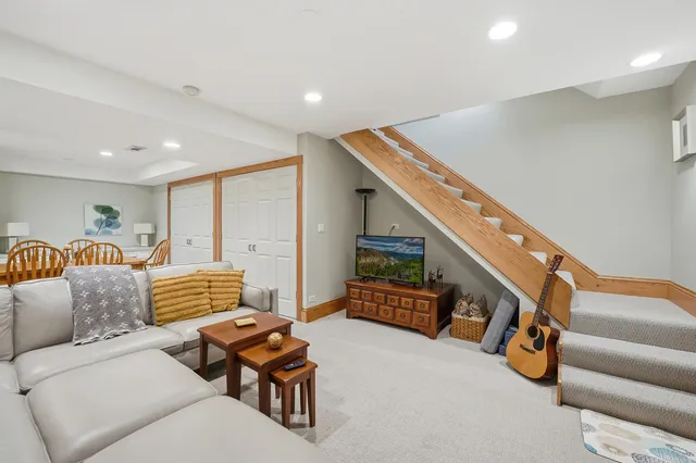a living room with furniture and a couch