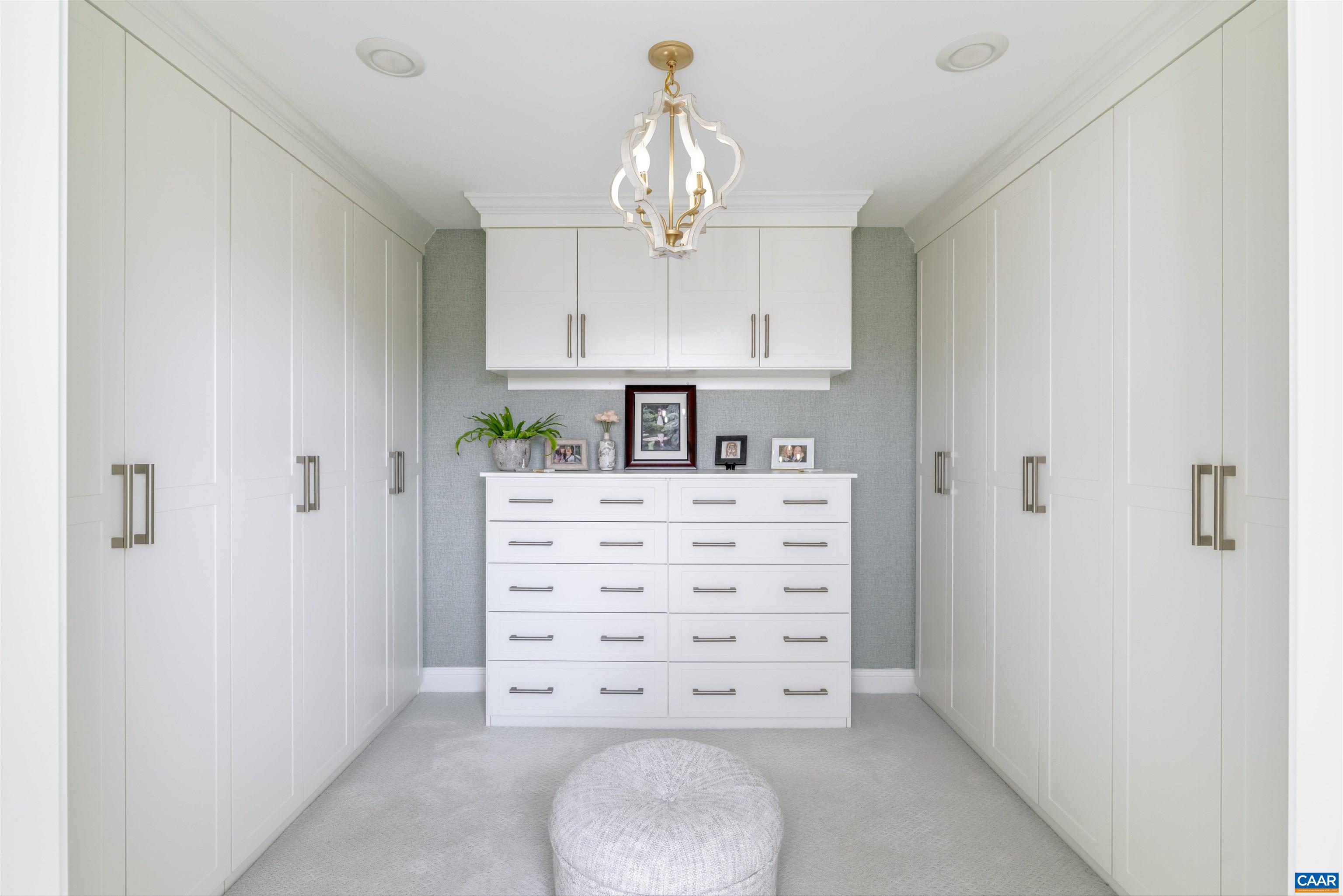 312 Bishopgate Lane Crozet, VA 22932 - Photo 12 of 22 a view of kitchen with kitchen island white cabinets and stainless steel appliances