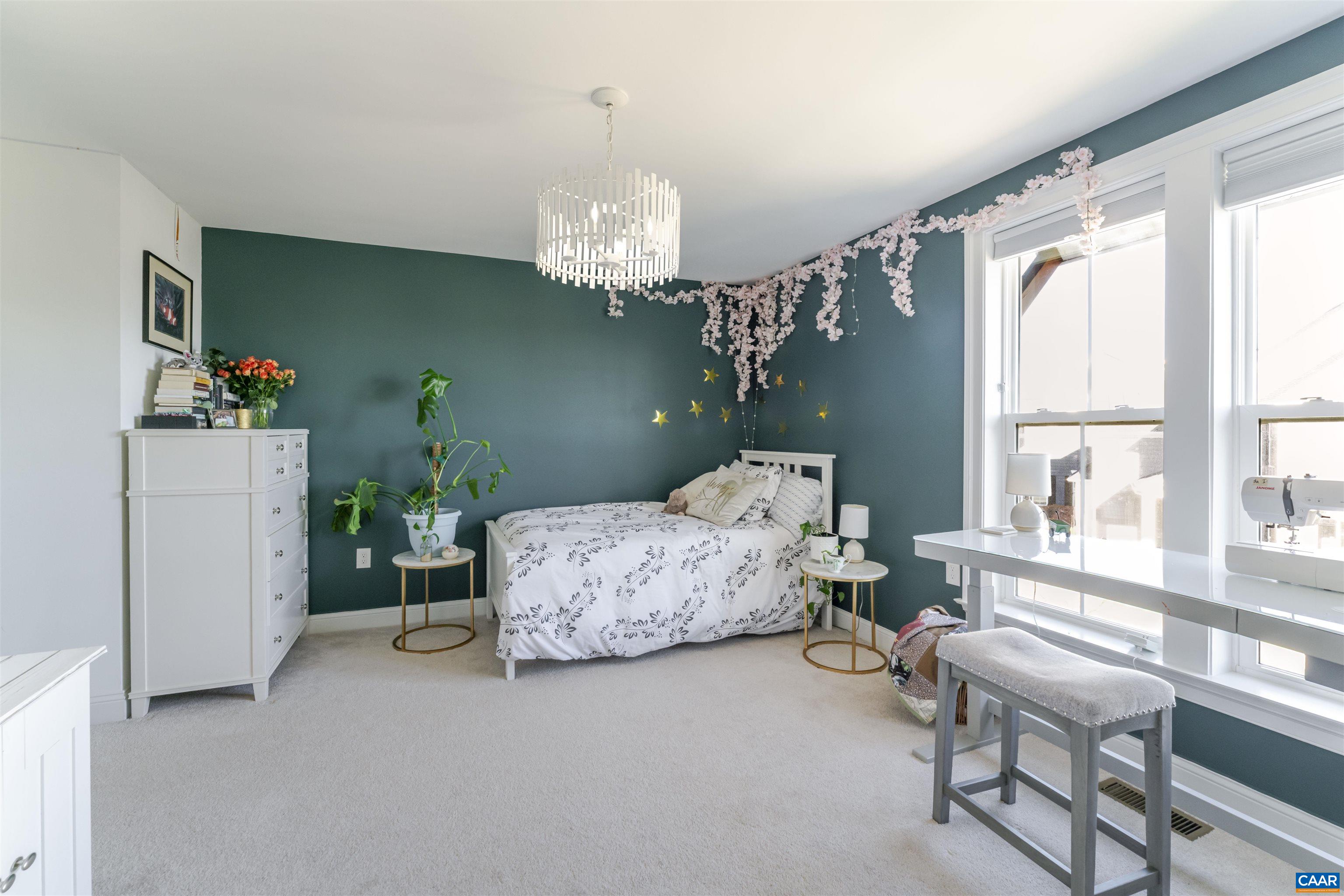 312 Bishopgate Lane Crozet, VA 22932 - Photo 16 of 22 a living room with furniture and a chandelier