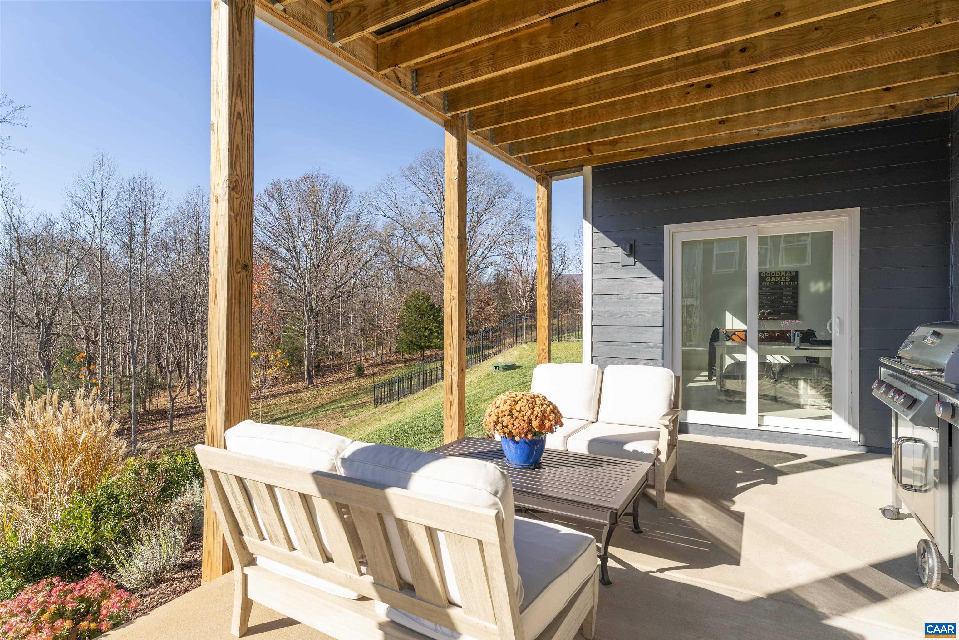 312 Bishopgate Lane Crozet, VA 22932 - Photo 21 of 22 a view of a patio with a table chairs and backyard