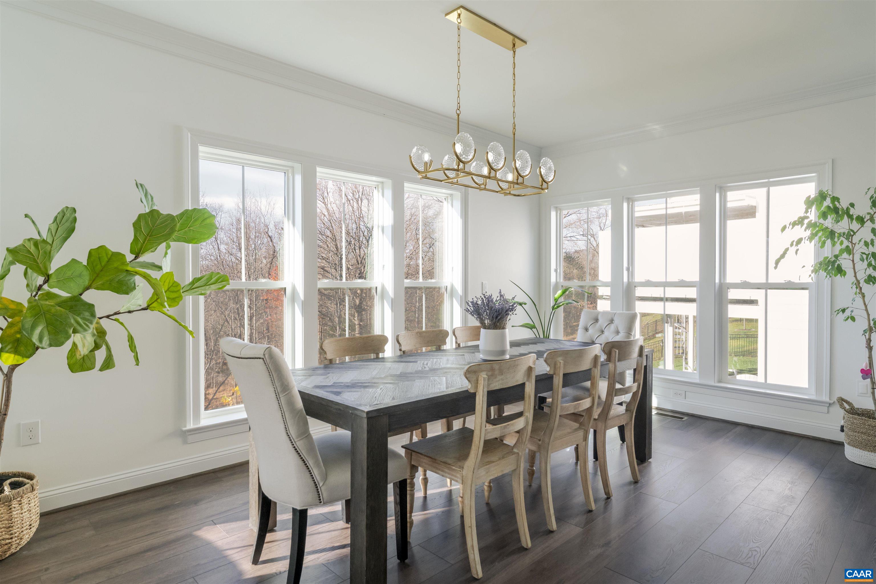 312 Bishopgate Lane Crozet, VA 22932 - Photo 8 of 22 a view of a dining room with furniture window and wooden floor