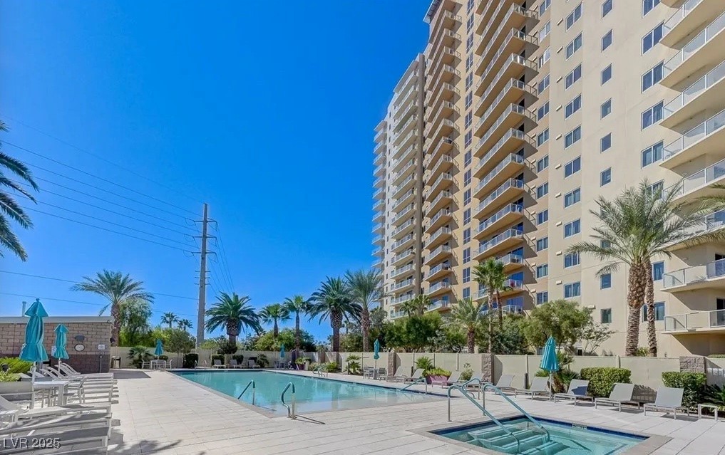 8255 South Las Vegas Boulevard, Unit 1504 Las Vegas, NV 89123 - Photo 27 of 29 Pool featuring a patio and fence
