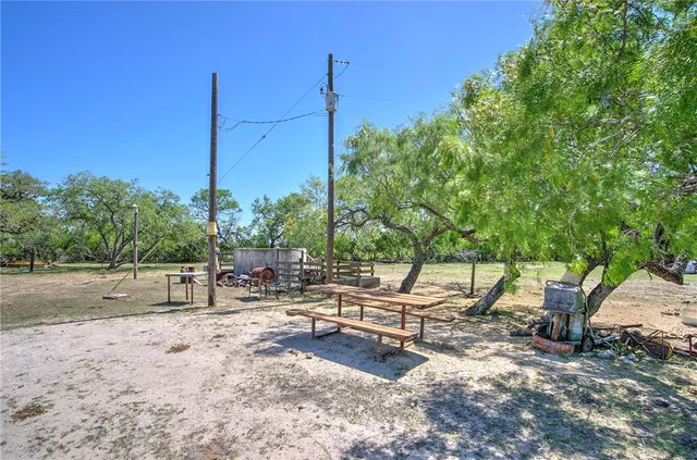 a view of multiple houses with yard