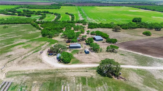 a view of a garden with a lake