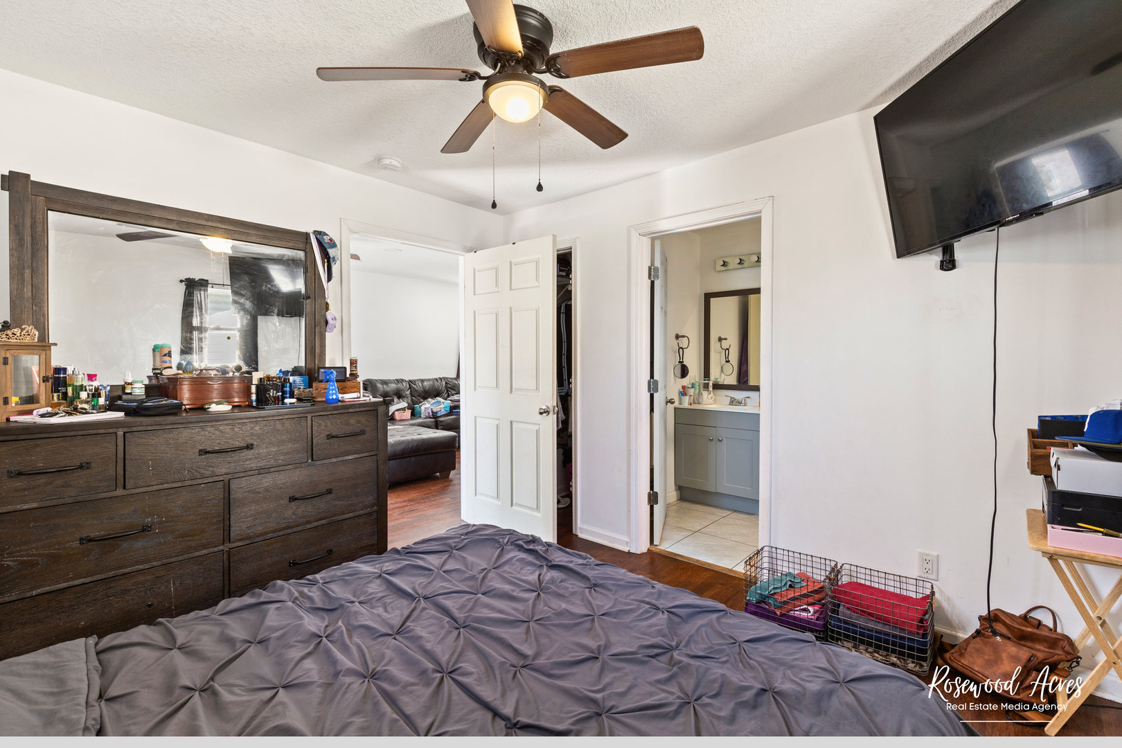 245 North 6th Avenue Kankakee, IL 60901 - Photo 11 of 16 a bedroom with a bed and a mirror on the dresser