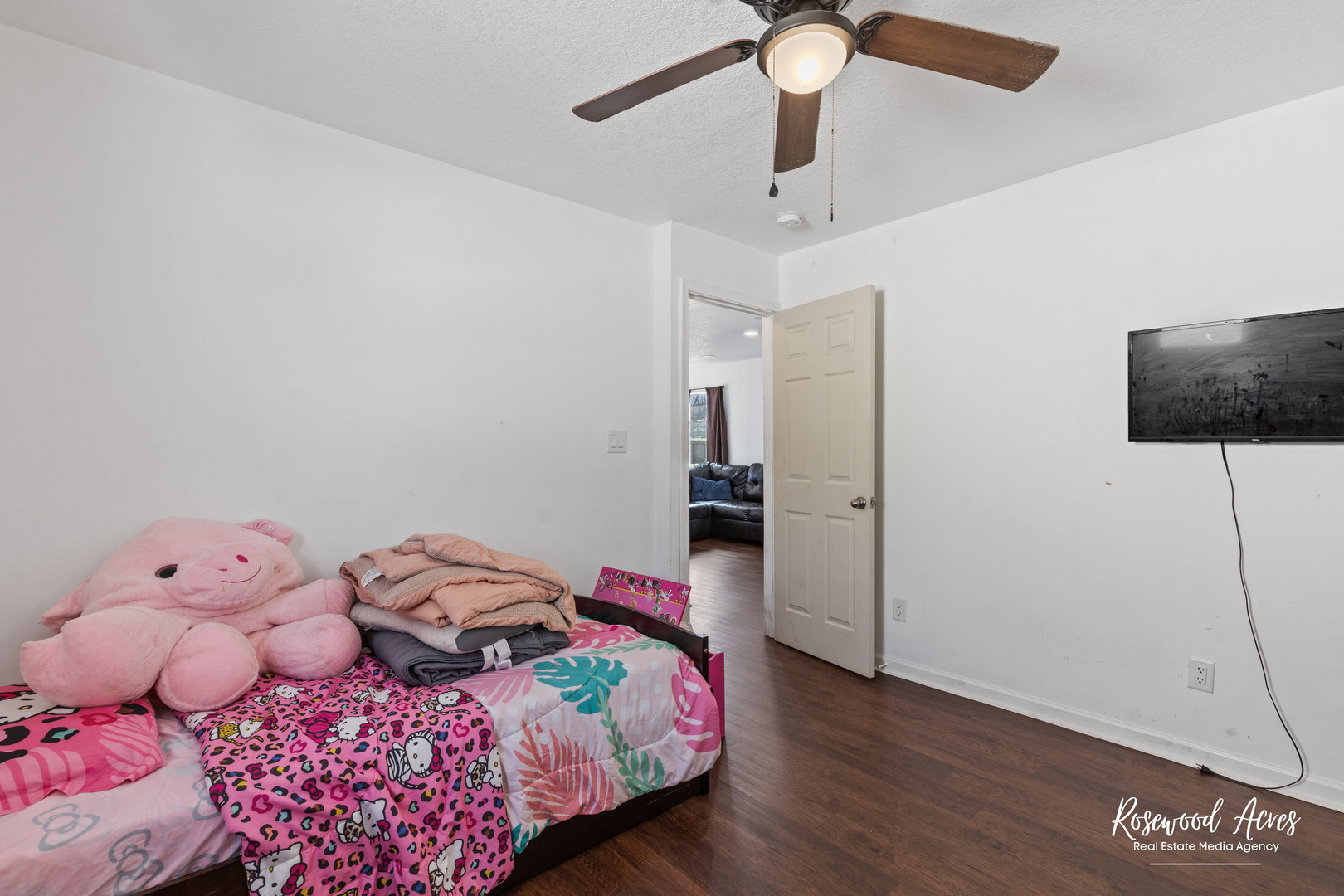 245 North 6th Avenue Kankakee, IL 60901 - Photo 8 of 16 a bedroom with a bed and wooden floor