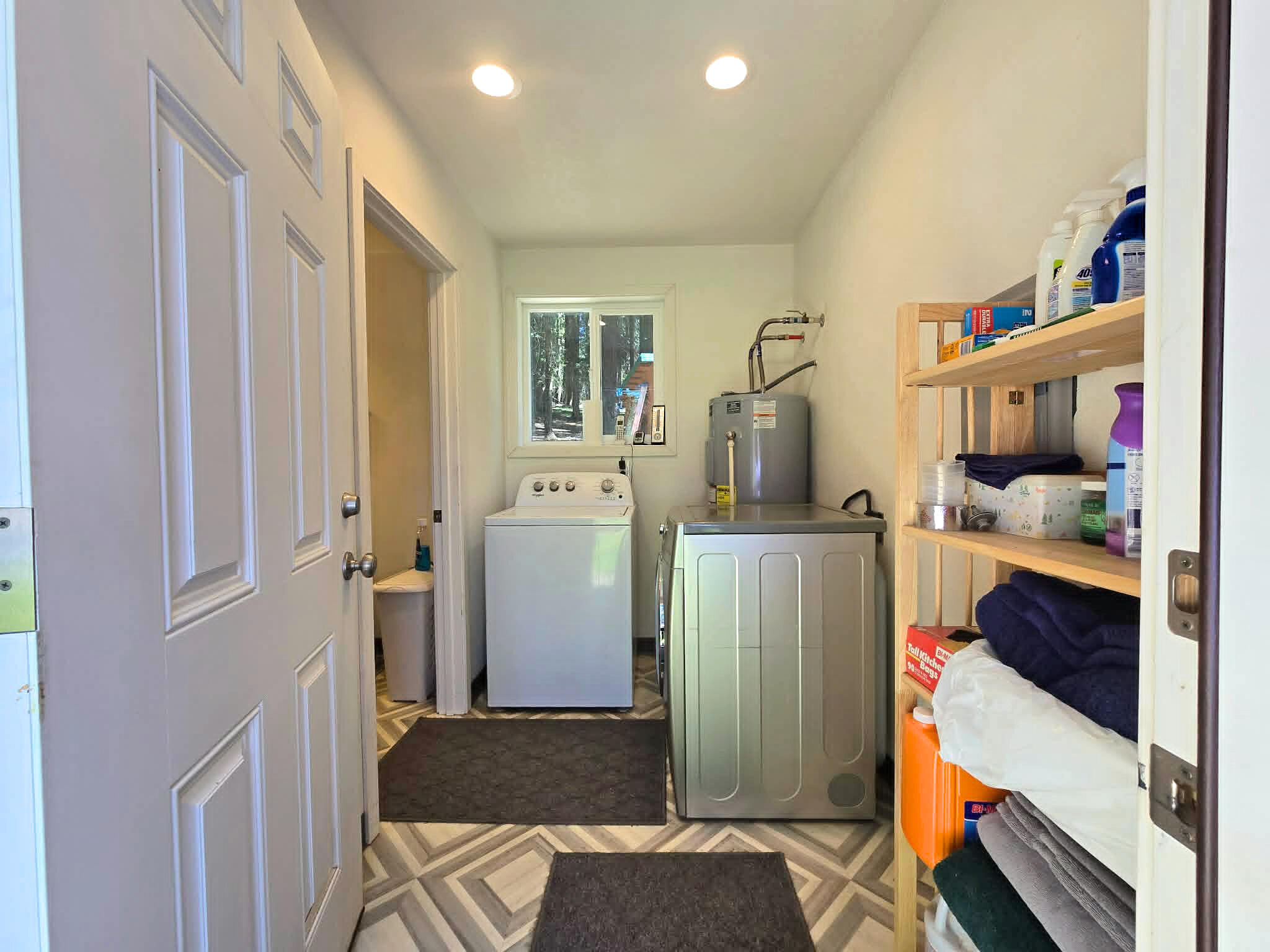 836 Ulrich Road Prospect, OR 97536 - Photo 26 of 47 a bedroom with a bed and a cabinets
