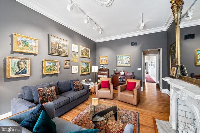 a living room with furniture or couch and a window