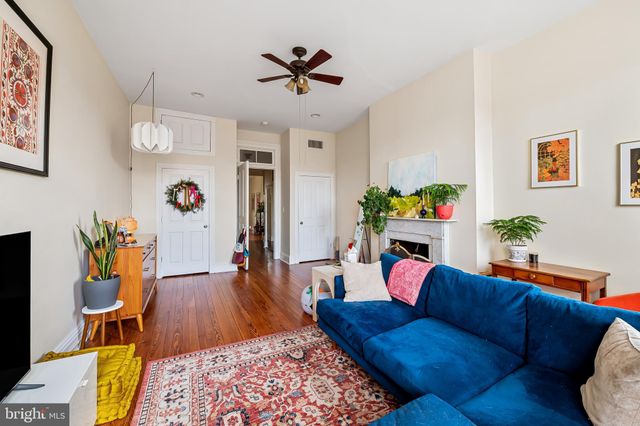 a workspace with furniture and wooden floor
