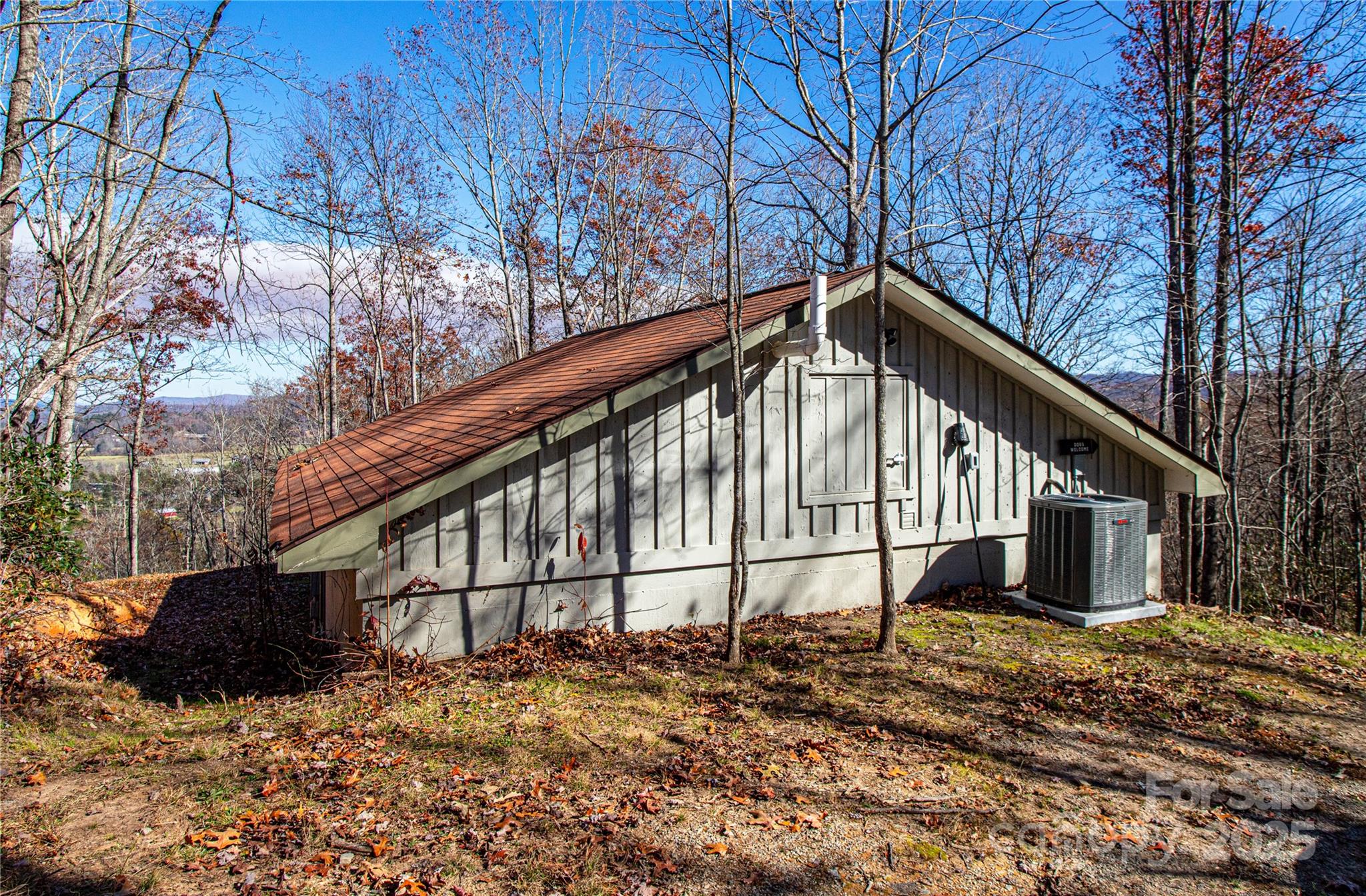 426-428 Weaver Creek Road Brevard, NC 28712 - Photo 31 of 48 a view of a house with a yard