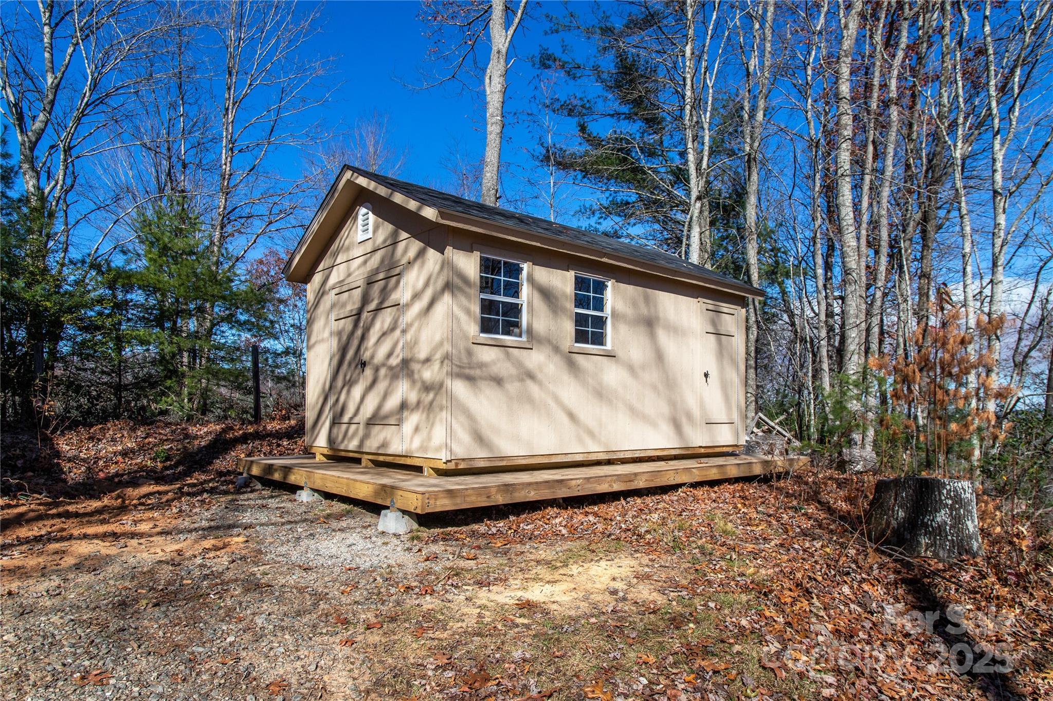 426-428 Weaver Creek Road Brevard, NC 28712 - Photo 32 of 48 a view of backyard with small cabin