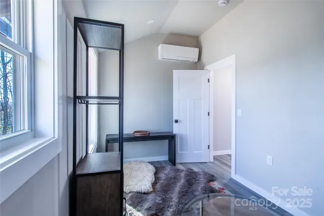 a view of livingroom with furniture and window