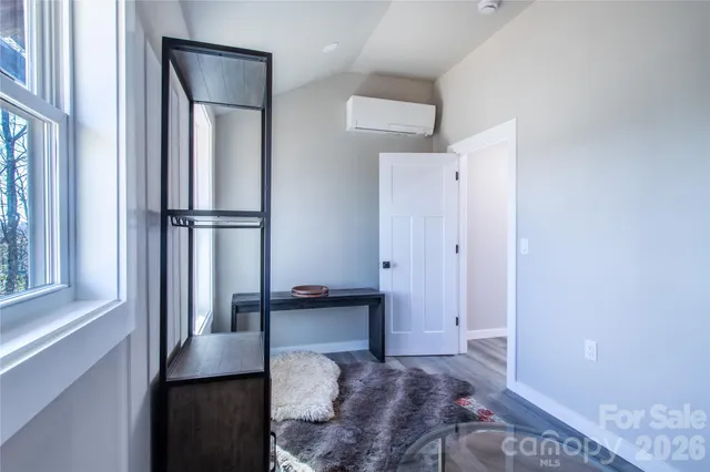 a kitchen with granite countertop a sink appliances and cabinets