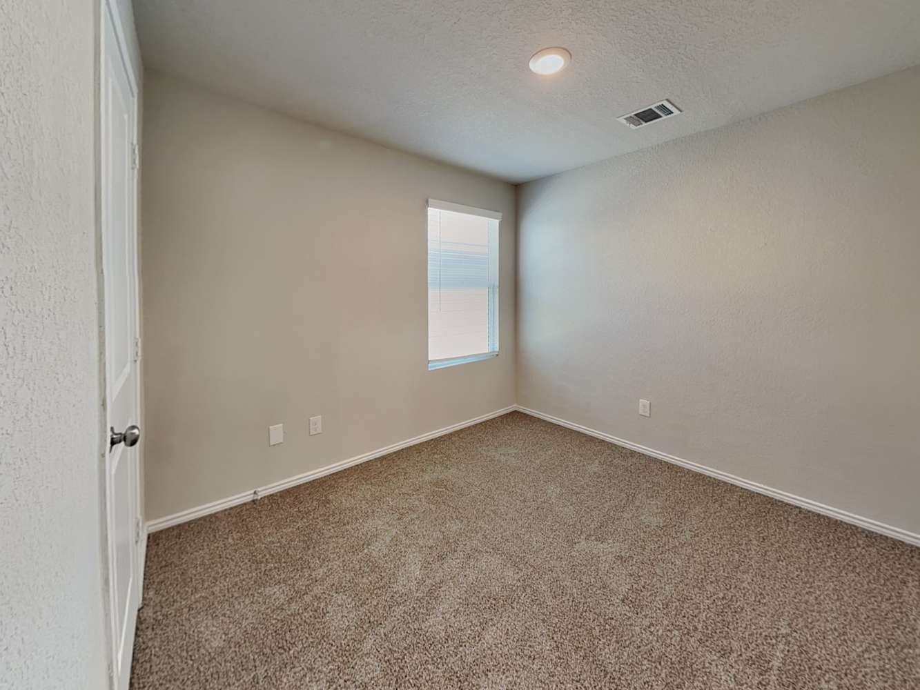 4322 Rapids Way San Antonio, TX 78223 - Photo 11 of 17 an empty room with closet and windows