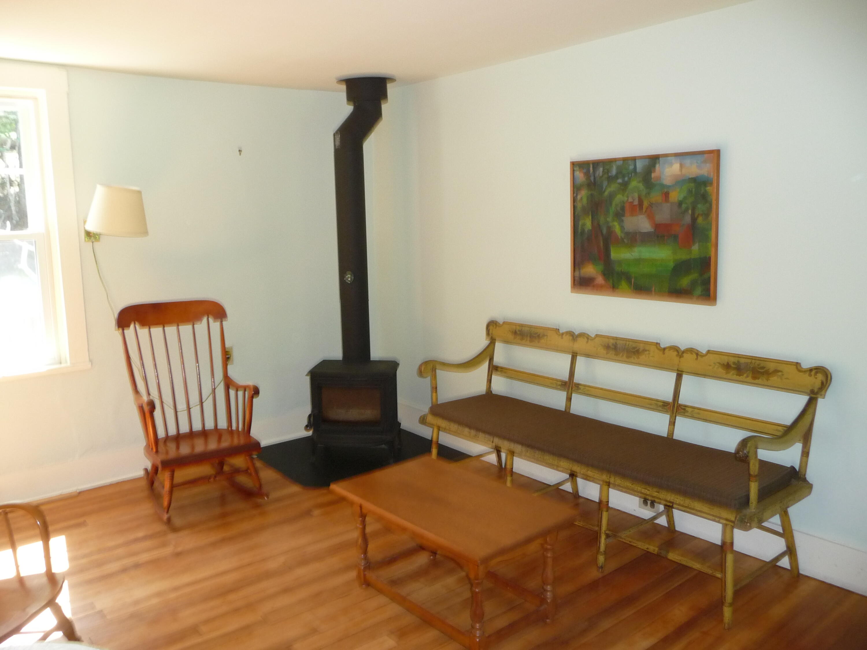 1 Beech Hill Road Mount Desert, ME 04660 - Photo 7 of 36 Woodstove in main house living room.