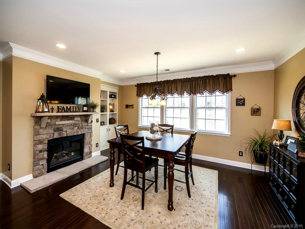 930 Solandra Way Tega Cay, SC 29708 - Photo 12 of 24 a view of a livingroom with furniture and a fireplace