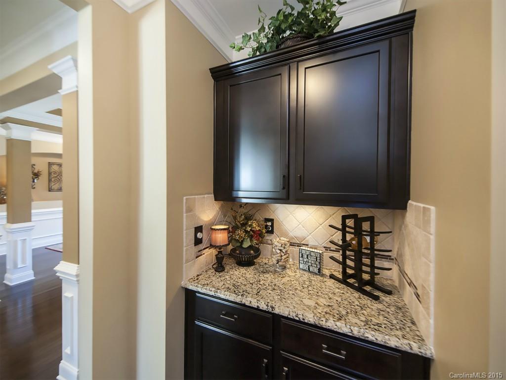 930 Solandra Way Tega Cay, SC 29708 - Photo 13 of 24 a bathroom with a sink and mirror