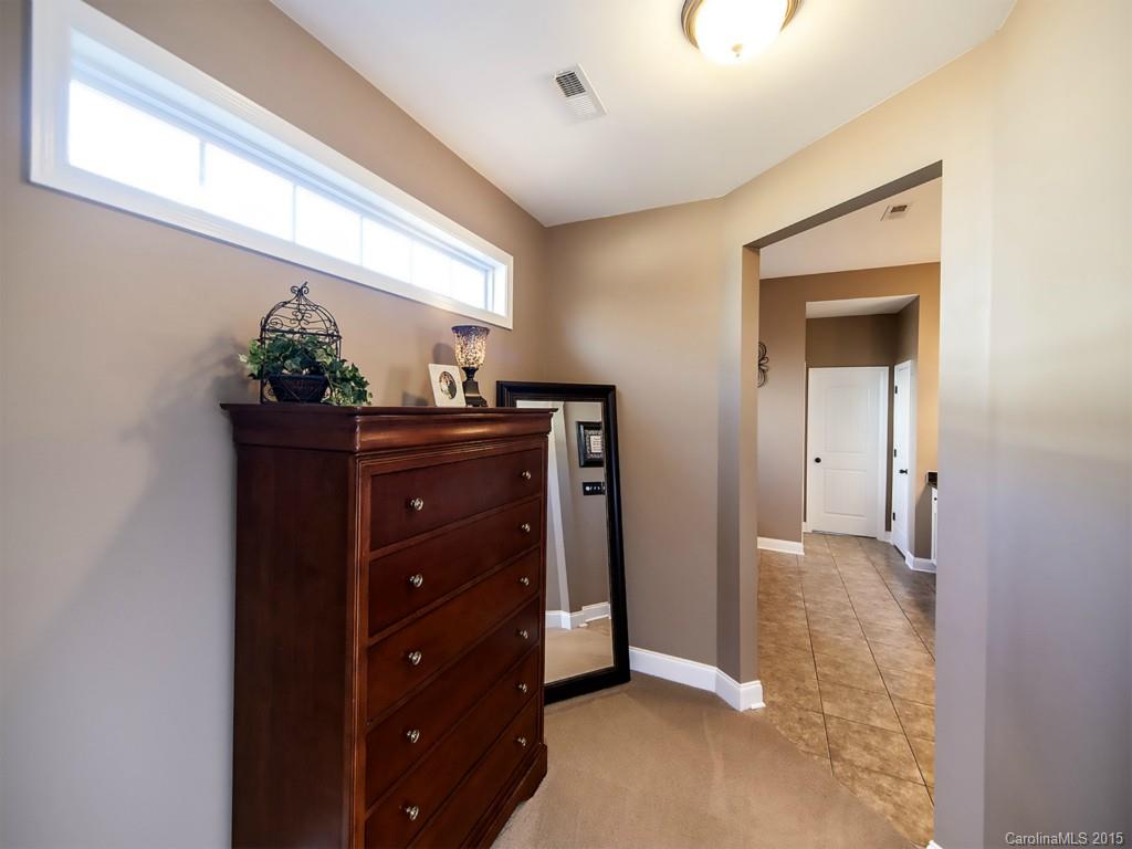 930 Solandra Way Tega Cay, SC 29708 - Photo 16 of 24 a view of a hallway to a livingroom and a window