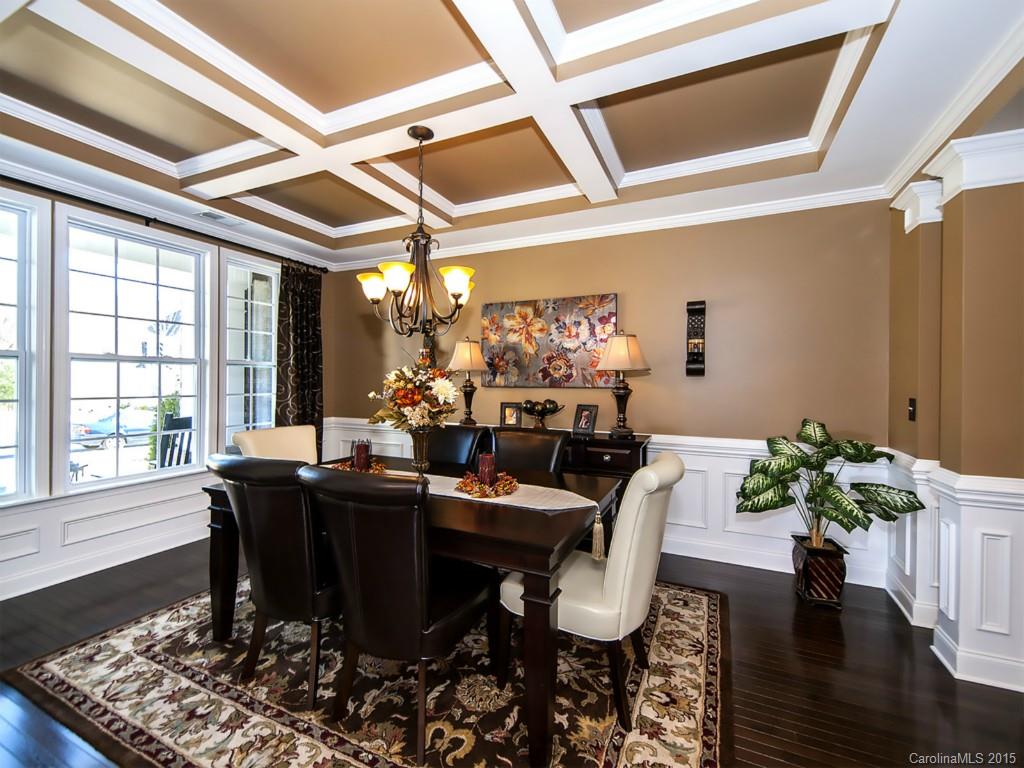 930 Solandra Way Tega Cay, SC 29708 - Photo 3 of 24 a dining room with furniture and wooden floor