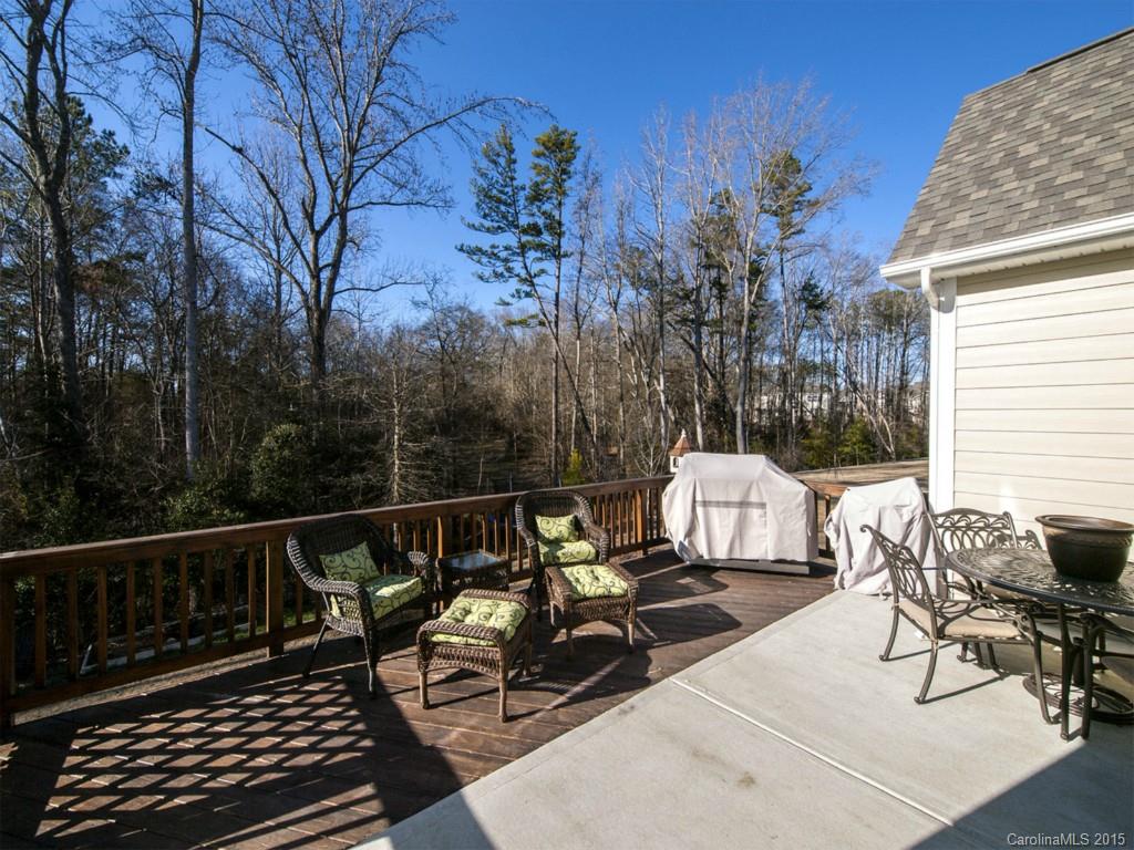 930 Solandra Way Tega Cay, SC 29708 - Photo 24 of 24 a view of balcony with wooden floor and outdoor seating