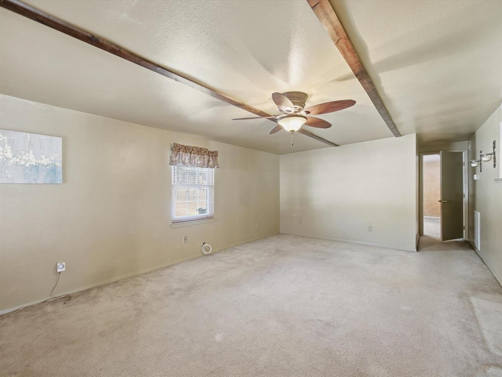 196 Perch Road Bowie, TX 76230 - Photo 16 of 33 wooden floor in an empty room