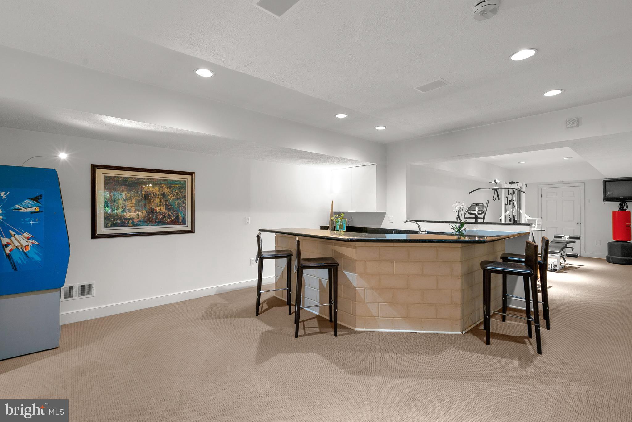 10823 Lockland Road Potomac, MD 20854 - Photo 67 of 92 Walk Out Lower Level Recreation Room + Bar