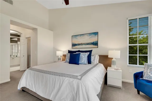 a bathroom with double sink and a mirror