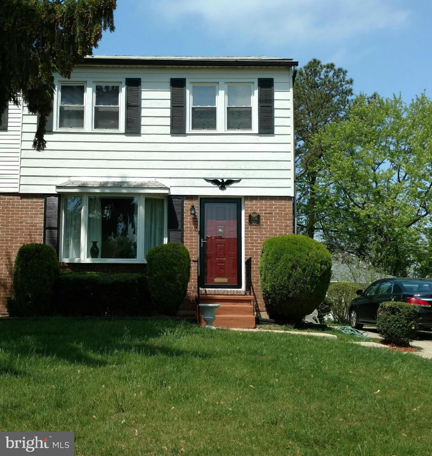 7136 Bexhill Road Baltimore, MD 21244 - Photo 1 of 27 a view of a house with a garden