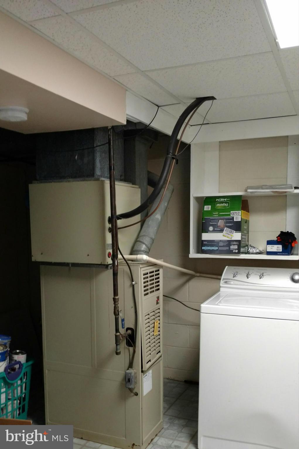 7136 Bexhill Road Baltimore, MD 21244 - Photo 22 of 27 a utility room with washer and dryer