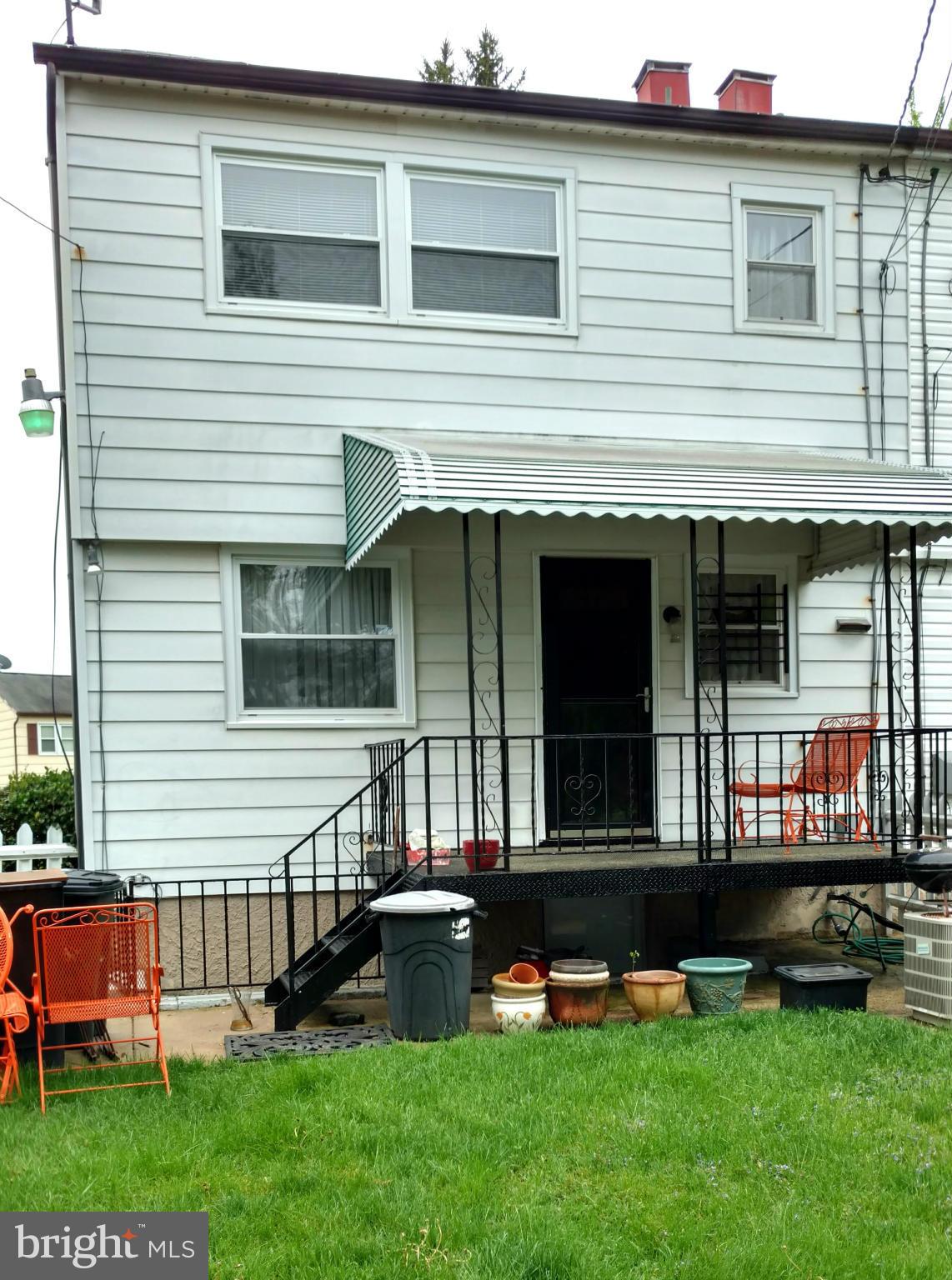 7136 Bexhill Road Baltimore, MD 21244 - Photo 25 of 27 a front view of a house with a yard