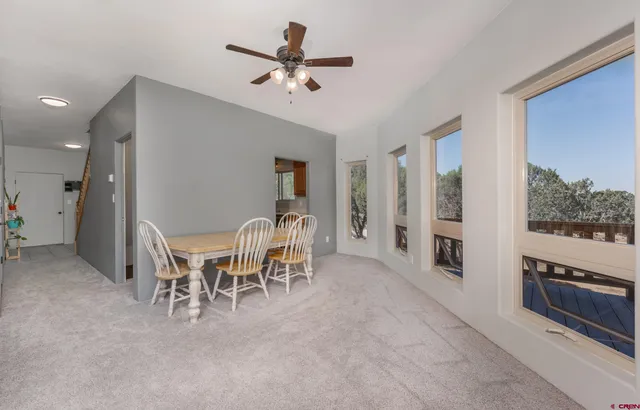 a kitchen with sink cabinets and window
