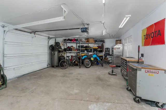 a aerial view of a house with a yard and garden