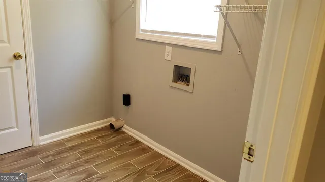 a view of a room with a window