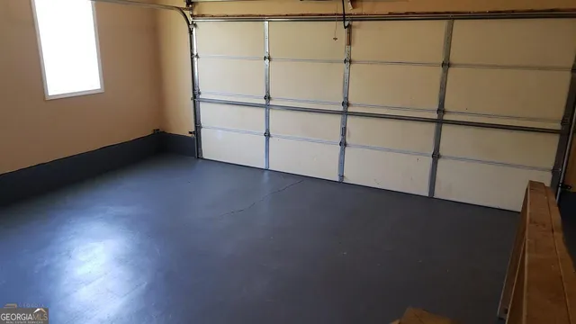 an empty room with wooden floor