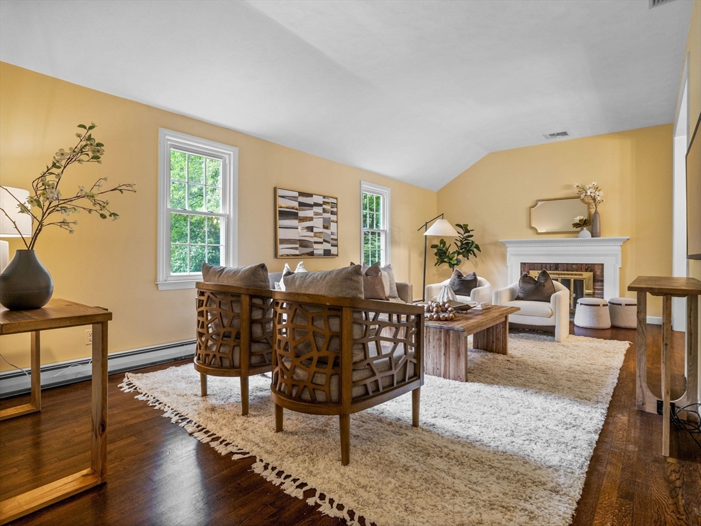 14 Pond Street Dover, MA 02030 - Photo 12 of 25 a view of a livingroom with furniture window and wooden floor