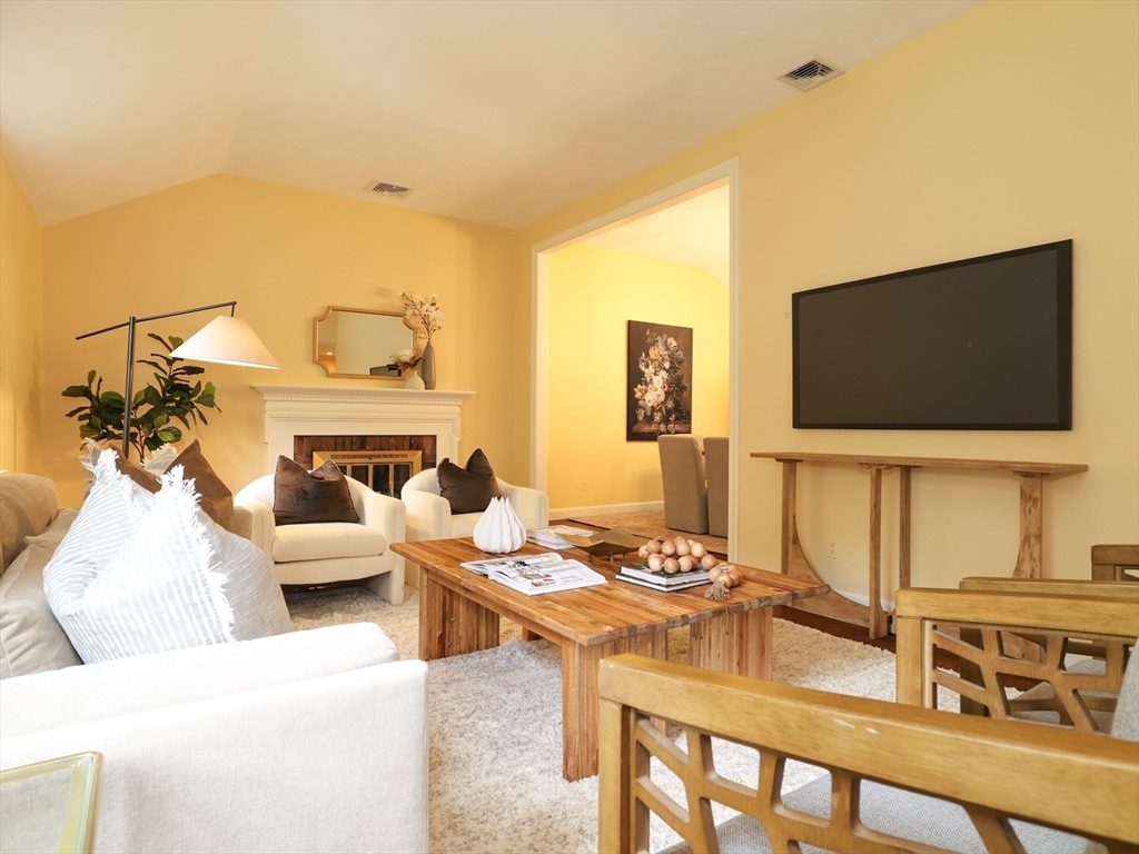 14 Pond Street Dover, MA 02030 - Photo 13 of 25 a living room with furniture and a flat screen tv