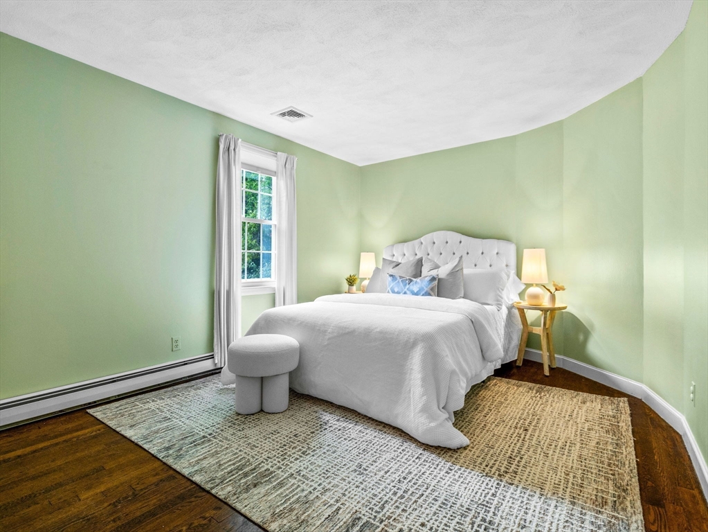 14 Pond Street Dover, MA 02030 - Photo 19 of 25 a bedroom with a bed and window