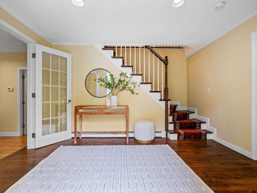 14 Pond Street Dover, MA 02030 - Photo 3 of 25 a living room with furniture and a mirror
