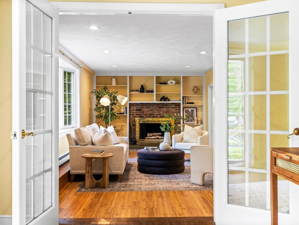 14 Pond Street Dover, MA 02030 - Photo 4 of 25 a living room with furniture and a fireplace