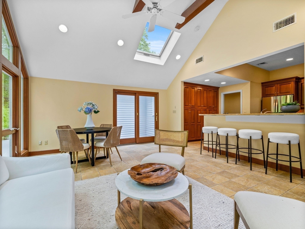 14 Pond Street Dover, MA 02030 - Photo 8 of 25 a living room with furniture and a dining table
