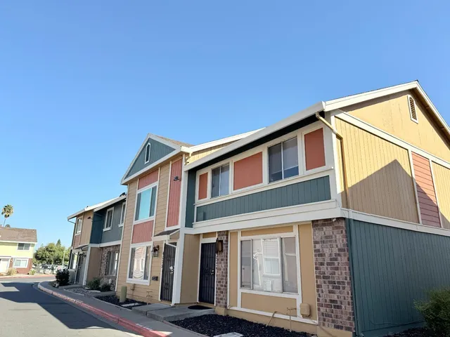 a view of a house with a street