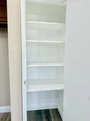 a view of an empty walk in closet