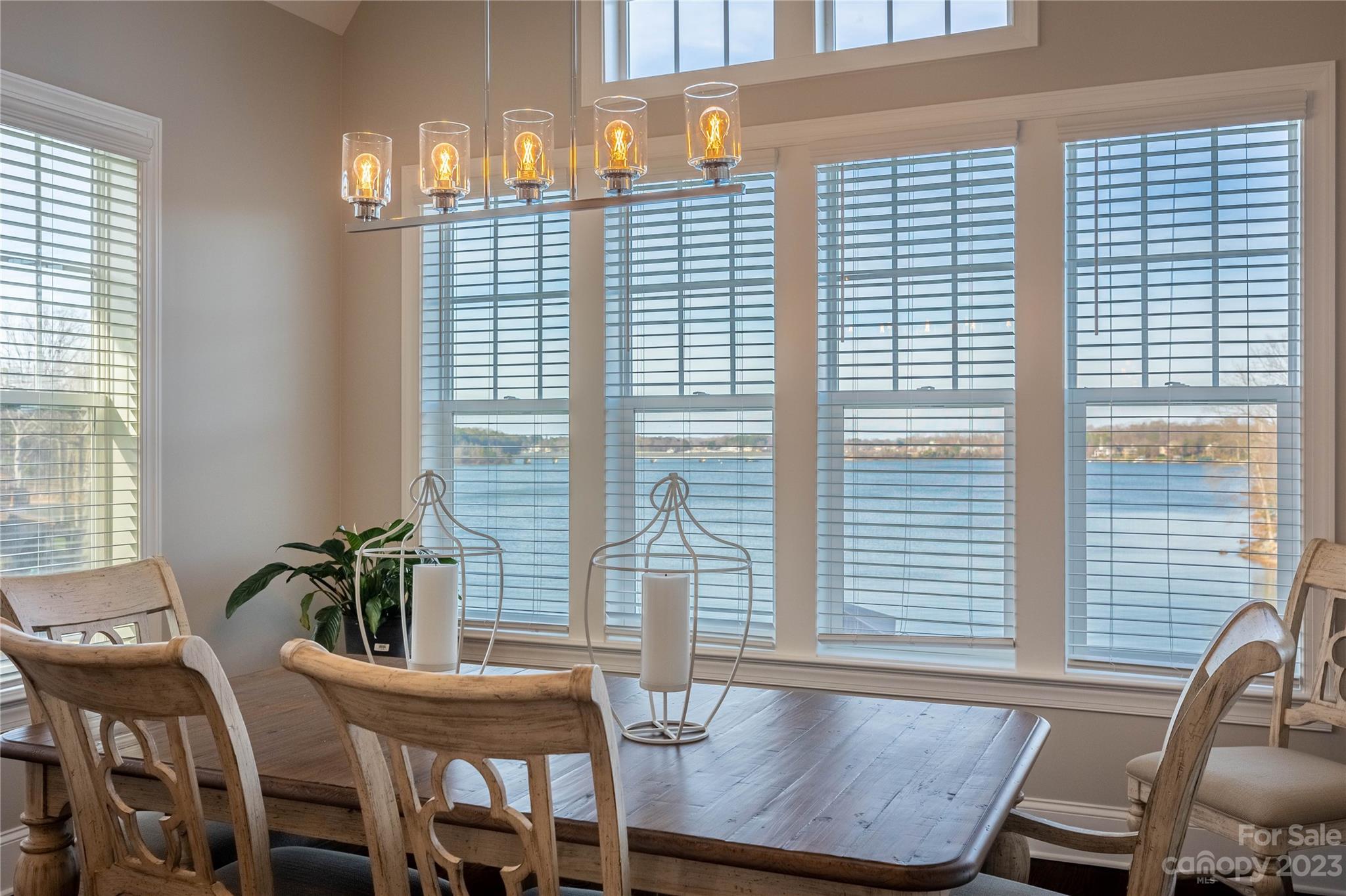 9110 Greenwood Road Terrell, NC 28682 - Photo 11 of 42 a view of a dining room with furniture and windows