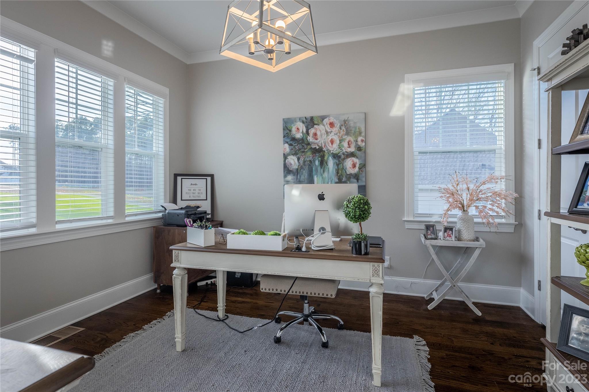 9110 Greenwood Road Terrell, NC 28682 - Photo 17 of 42 a view of a workspace with furniture and a window