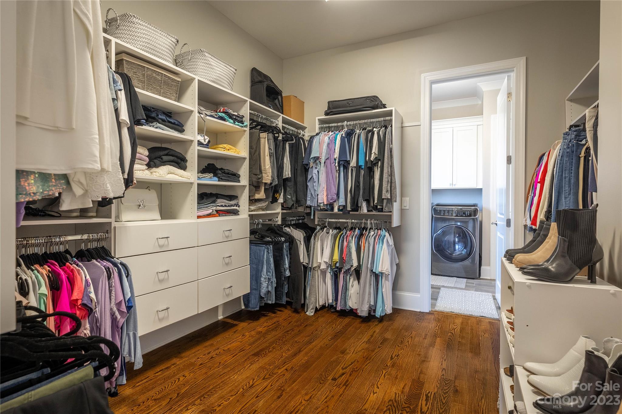 9110 Greenwood Road Terrell, NC 28682 - Photo 24 of 42 a view of walk in closet with clothes and shoes
