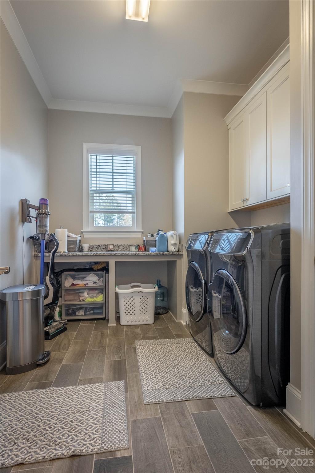 9110 Greenwood Road Terrell, NC 28682 - Photo 25 of 42 a utility room with sink dryer and washer