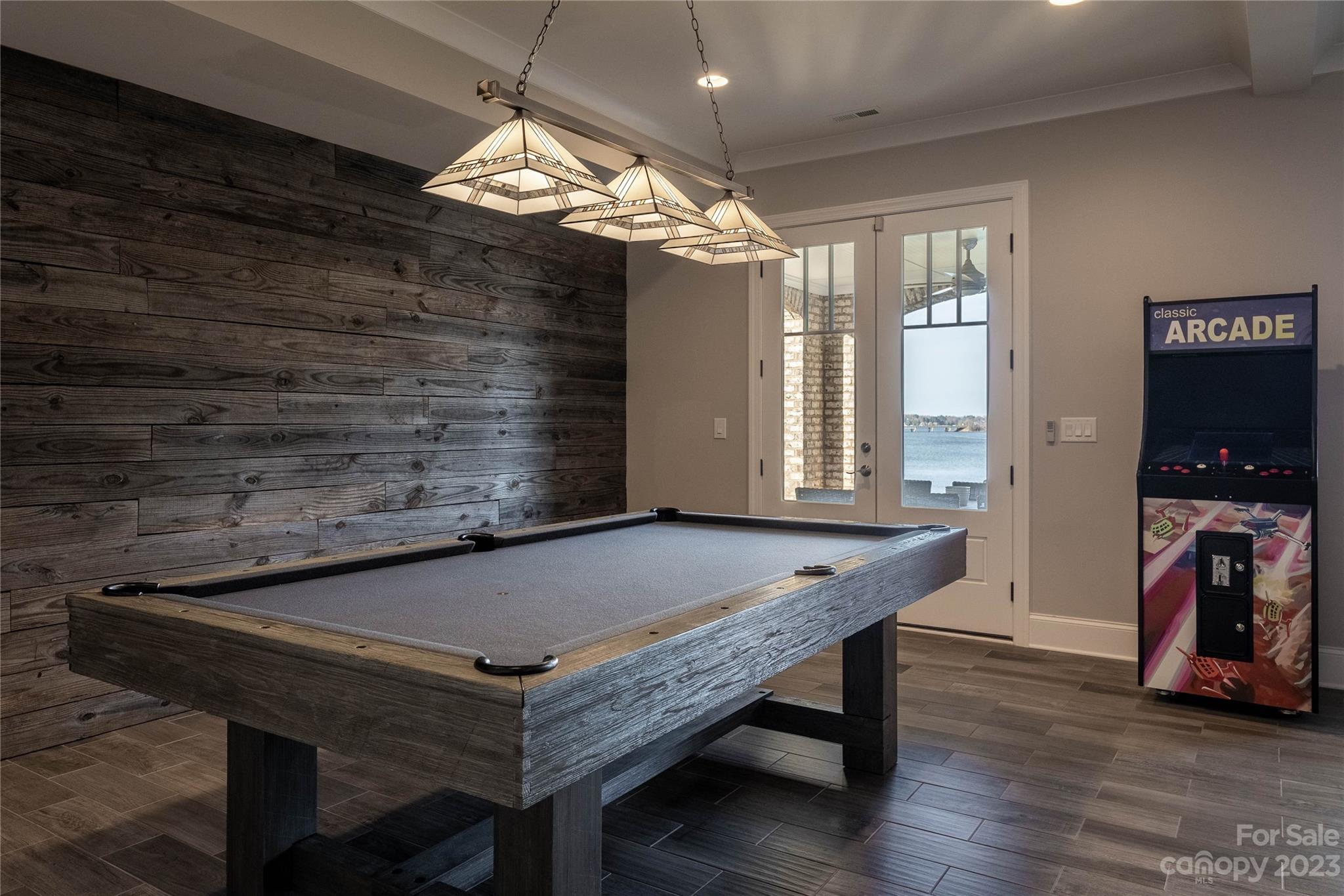 9110 Greenwood Road Terrell, NC 28682 - Photo 32 of 42 a view of a livingroom with furniture and a chandelier