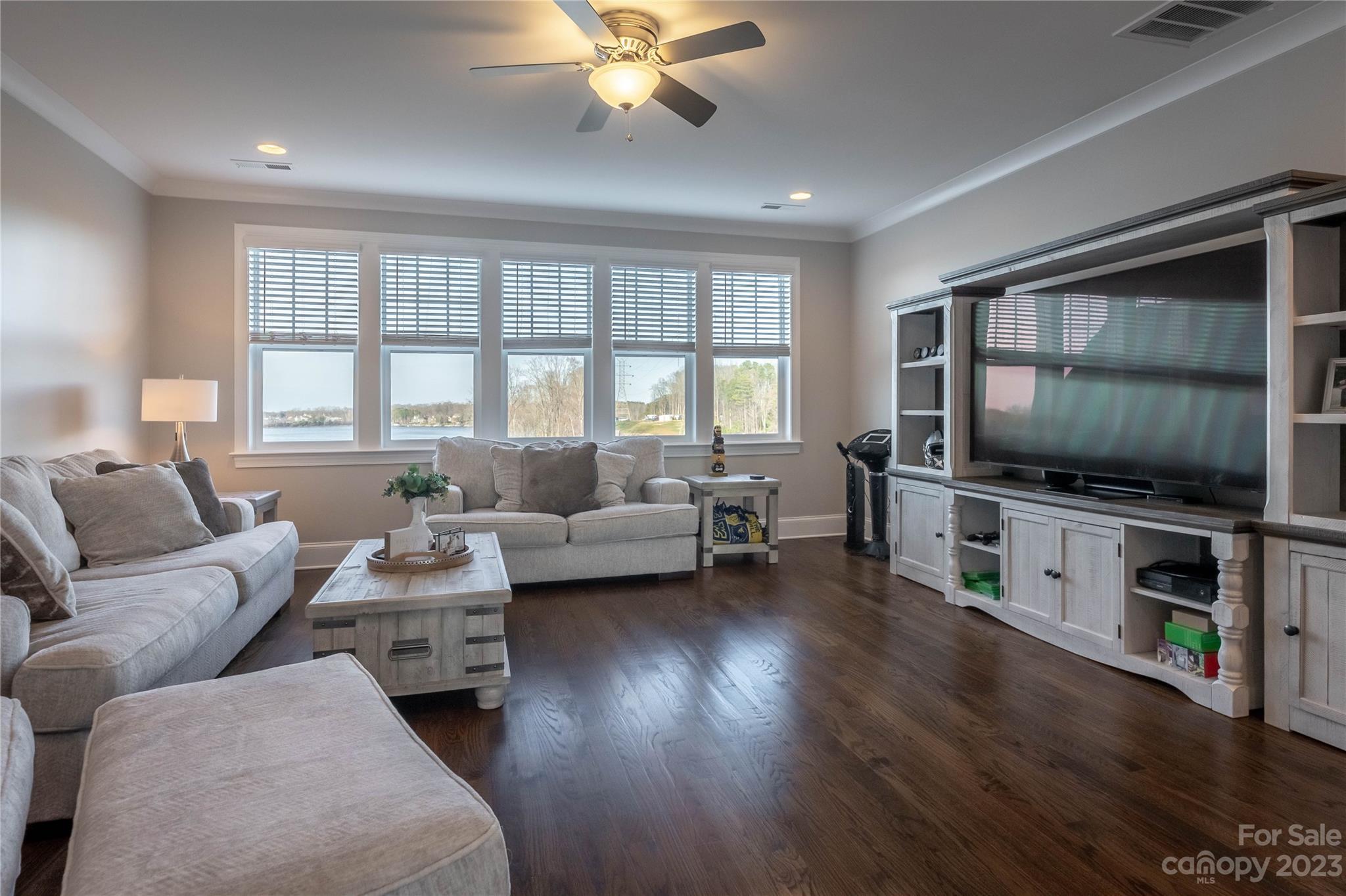 9110 Greenwood Road Terrell, NC 28682 - Photo 37 of 42 a living room with furniture and a flat screen tv